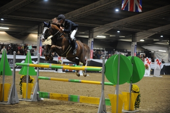 Sandy McLean lands the feature ALX Horseboxes Major Grand Prix at Arena UK with Gino F